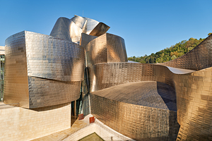 Visit Guggenheim Museum in Bilbao Spain on a sunny day