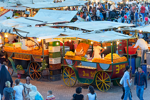 Orange juice stall in Djema el Fna square during sunset in Marra