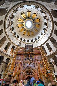 Visitors explore the church of the Holy Sepulchre in Jerusalem