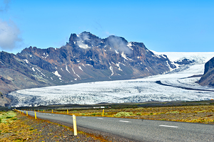 Glacier in Skaftafell Iceland with clear sky and road view
