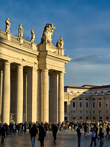 Tourists waiting to enter Saint Peters Basilica in Rome Italy by Marco Brivio