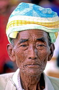 Portrait of an old man in Myanmar with a traditional head wrap