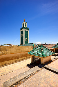 View of medersa bou inania minaret in meknes morocco