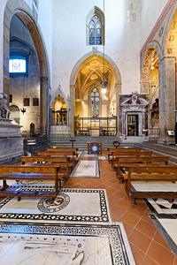 Basilica di Santa Croce in Florence shows church interior and de