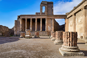 Exploring ancient Roman ruins in Pompeii near Naples Italy