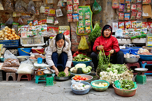 Women selling fresh vegetables in Hanoi market