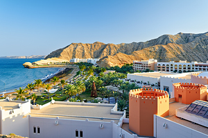 Elevated view of Muscat Oman with mountains and coastline