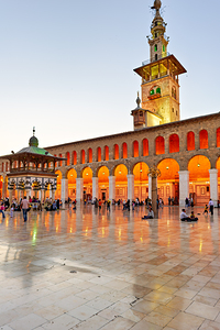 Visitors gather at Umayyad Mosque in Damascus during evening hou