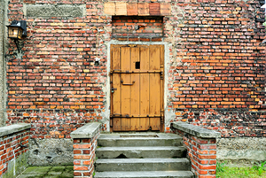 Brown door at Auschwitz concentration camp in Krakow Poland