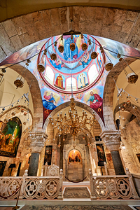 People explore the Holy Sepulchre Church in Jerusalem