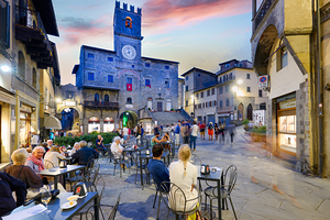 Palazzo del Popolo in Cortona Tuscany during sunset hours