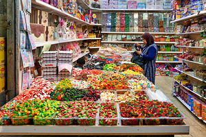 Grocer sells sweets and snacks in old city of Jerusalem