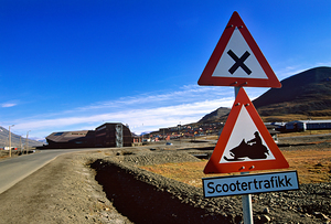 Danger sign for snowmobile traffic in Longyearbyen area by Marco Brivio