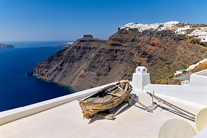 Santorini: Old boat white village and caldera view.