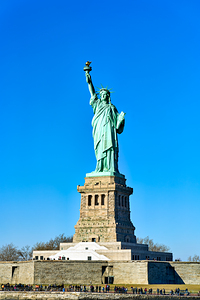 Statue of Liberty stands tall on Liberty Island in Manhattan New