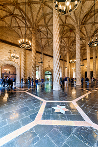 Visitors walk through the hall of Lonja de la Seda in Valencia S