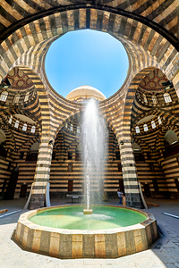 Visitors explore Khan Asad Pasha Caravanserai in Damascus Syri