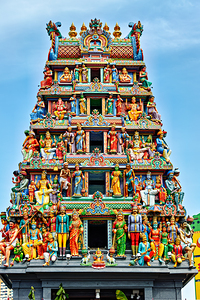 Visitors admire sculptures at Sri Mariamman Temple in Singapore