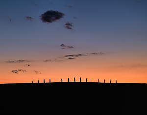 Typical cypresses and sunset in Val dOrcia Tuscany by Marco Brivio