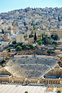 View of Roman Theater in Amman Jordan surrounded by city
