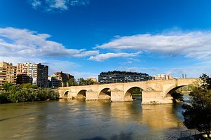 Exploring Puente de Piedra bridge in Zaragoza Spain
