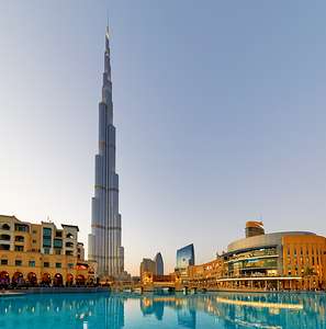 Burj Khalifa stands tall over Dubai skyline with water reflectio