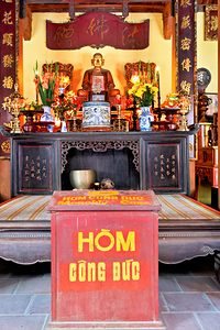 Hanoi temple with offering table and altar space for worshipers by Marco Brivio