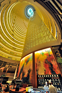 Grand hotel atrium with spiral design and sushi bar in Shanghai