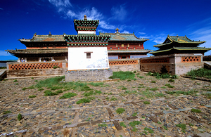 Erdene Zuu Monastery stands in Mongolia under a blue sky