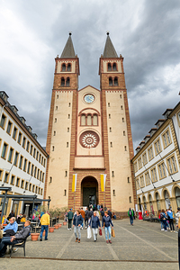 Visitors explore Wurzburger Dom Cathedral in Bavaria Germany