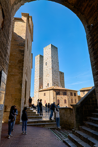 Visitors enjoy Piazza del Duomo in San Gimignano Italy
