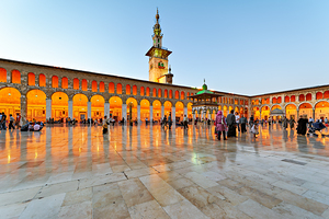 Visitors gather at Umayyad Mosque in Damascus during evening hou by Marco Brivio