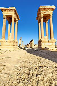 Exploring Palmyras ancient tetrapylon in Syria at noon