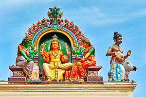 Visitors admire sculptures at Sri Mariamman Temple in Singapore