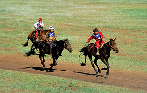 Horse racing at Naadam festival in Ulaanbaatar Mongolia