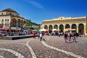People walk and gather in Monastiraki Square in Athens Greece