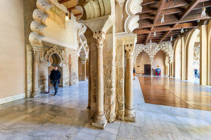 Visitors explore Aljaferia Palace in Zaragoza Spain