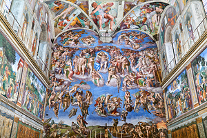 Visitors stand beneath the ceiling of Sistine Chapel in Vatican 