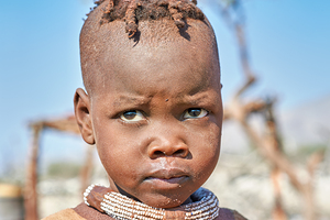 Portrait of a child from Himba village in Kunene region Namibia