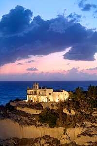 Sunset at the coastal town of Tropea in Calabria Italy by Marco Brivio