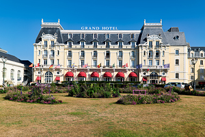 Visit Grand Hotel in Cabourg Normandy France on a sunny day