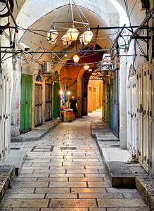 Cobbled street winding through the old city of Jerusalem in Isra