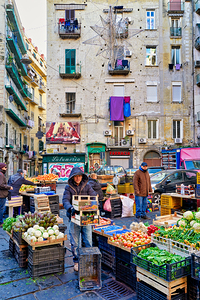 Greengrocer selling fresh produce in Pignasecca Naples Campania 