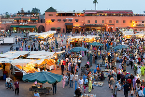 Sunset scene at Djema el Fna square in Marrakesh Morocco