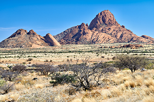 Granite peaks of Spizkoppe rise in Namib Desert of Namibia