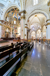 Valencia Spain Cathedral interior with visitors and seating area