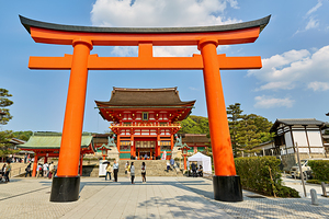 Fushimi Inari Taisha Shrine in Kyoto welcomes visitors on a sunn
