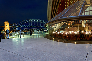Sydney Opera House and Harbour Bridge at night.