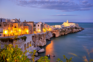 Vieste Gargano. Apulia Puglia Italy. Cape San Francesco and San Francesco church at sunset