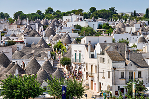 Apulia Puglia Italy. Alberobello. Trulli: traditional Apulian dry stone huts with a conical roof.